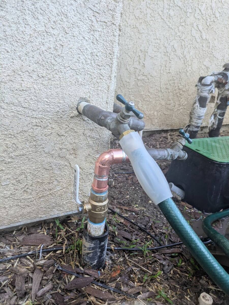 New quarter-turn ball valve and copper fitting installed on a main water line in Bakersfield